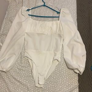 White bodysuit top. Never worn. Size 6